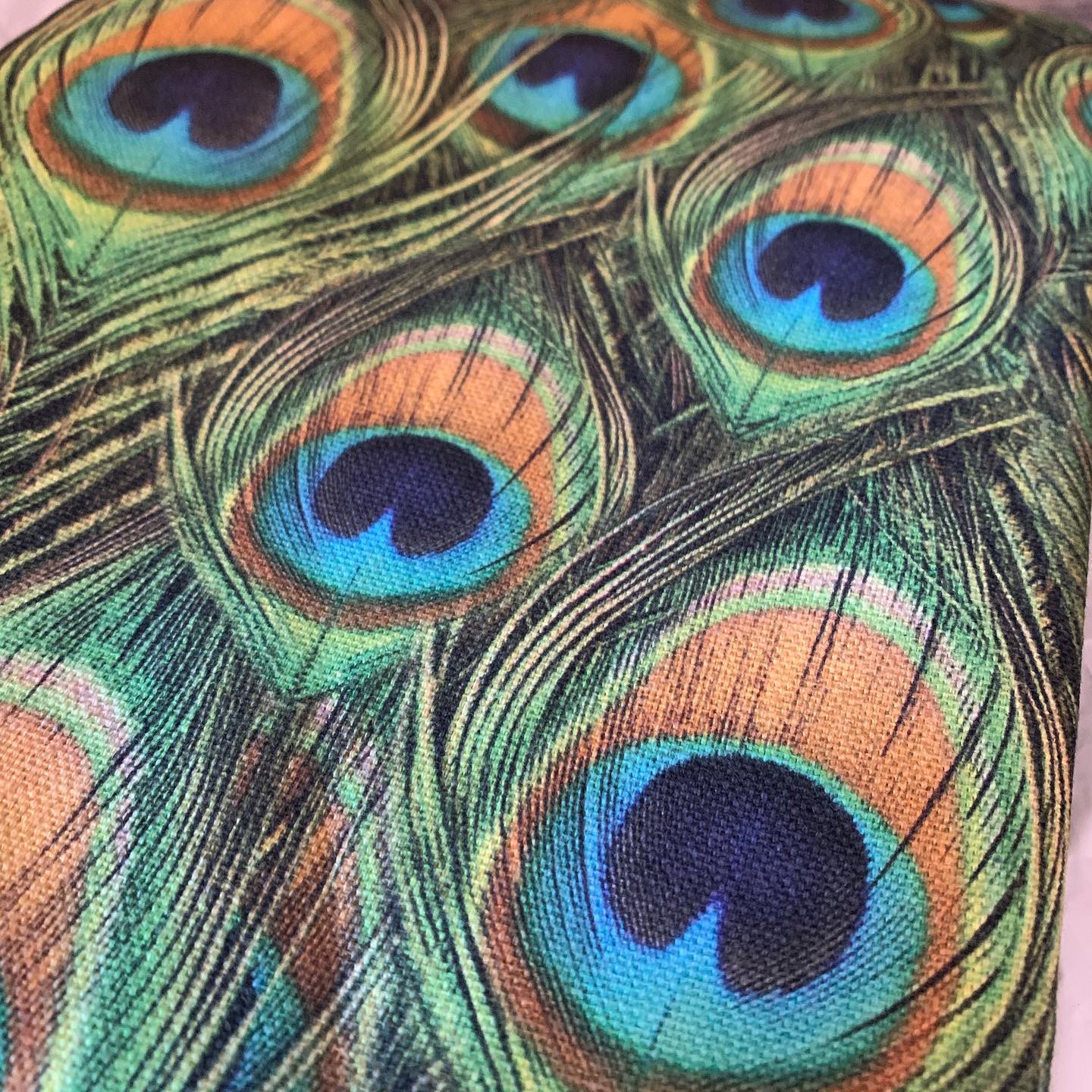 Just got this lovely peacock feather fabric ?!Can’t wait to see what it’ll look like on an ottoman!...#brightandcolourful #peacock #corsham #bird #nature #feathers #handcrafted #homewares #ginger #tweed #upholster #fabricobsessed